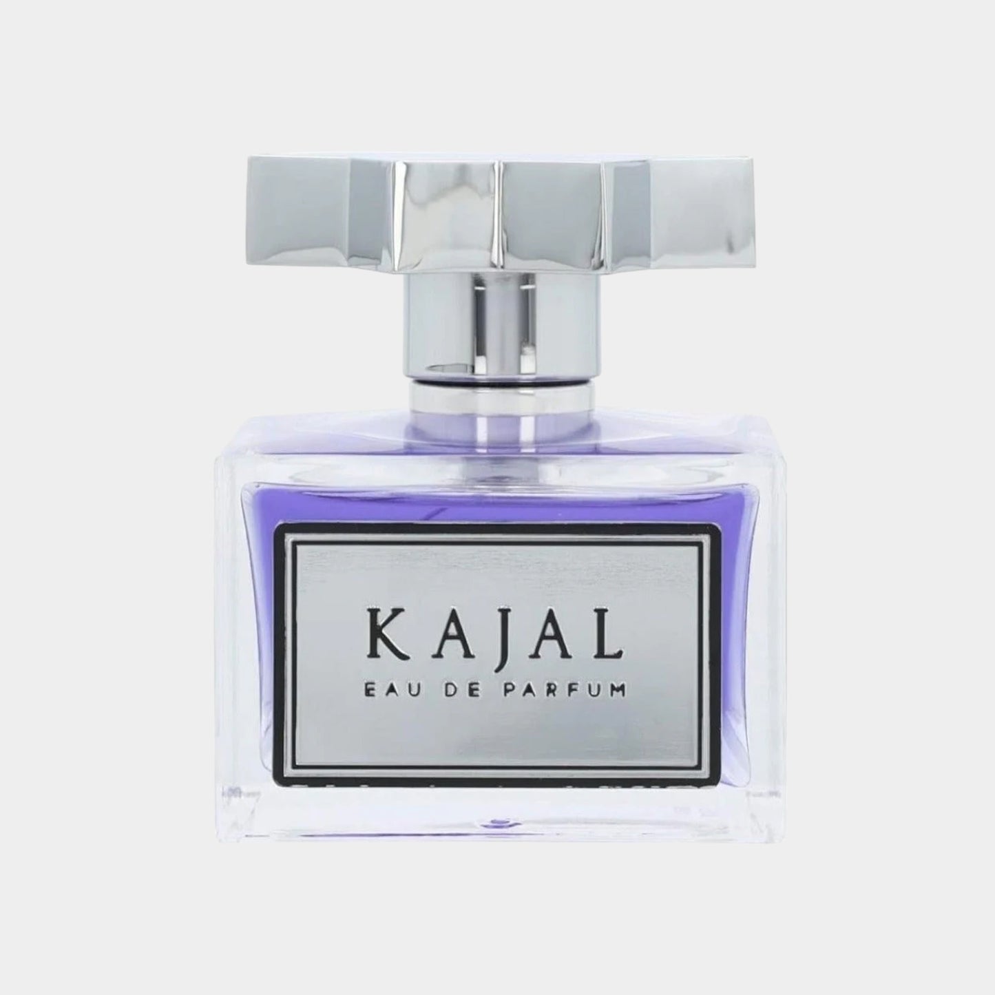 Kajal EDP Sample in een elegant glazen flesje, met een stijlvolle zilveren dop en een paarse vloeistof. Perfect voor een proefervaring van deze unieke geur.
