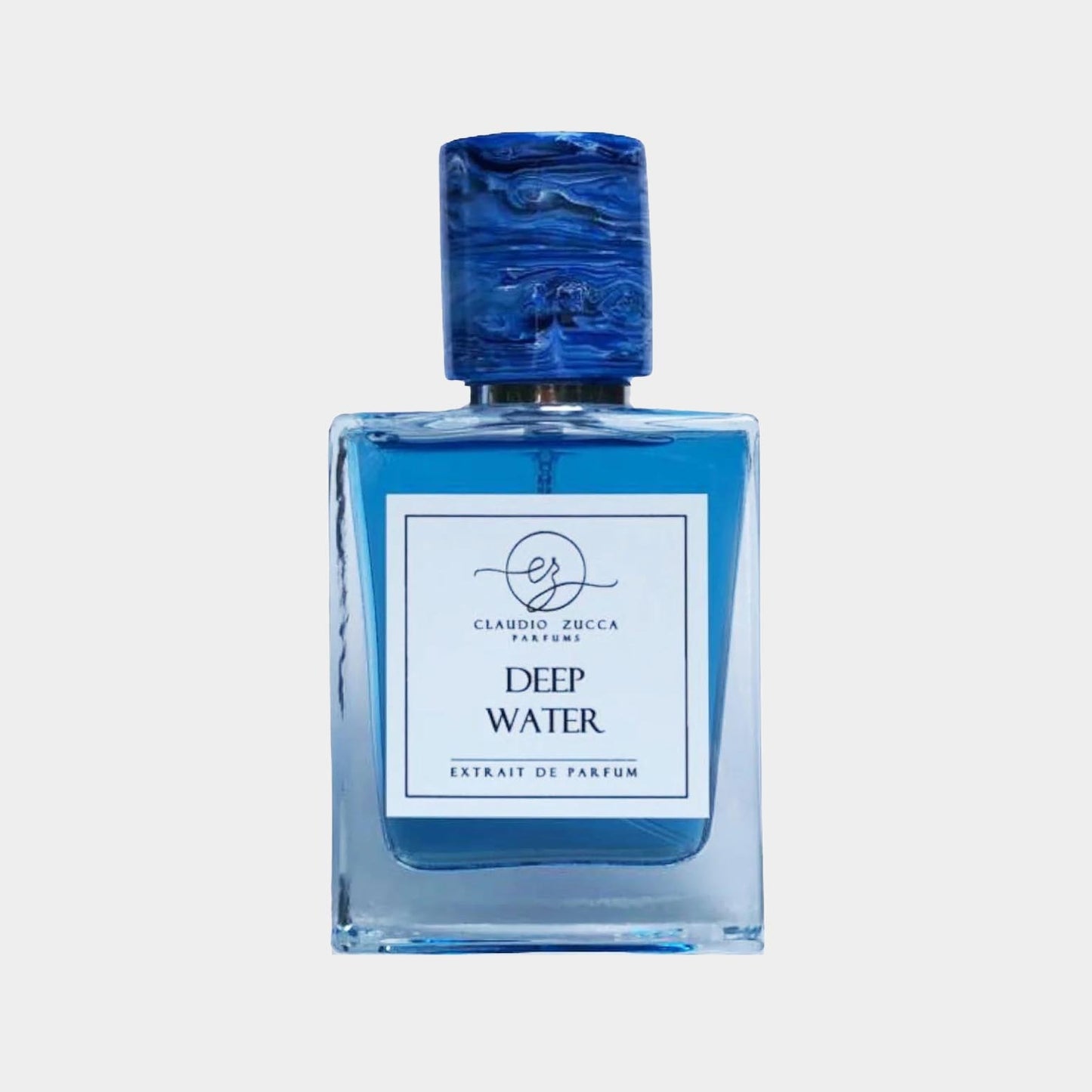 Claudio Zucca Deep Water Sample, een elegante parfumfles met een blauwe vloeistof en een kunstzinnig deksel dat doet denken aan golven.