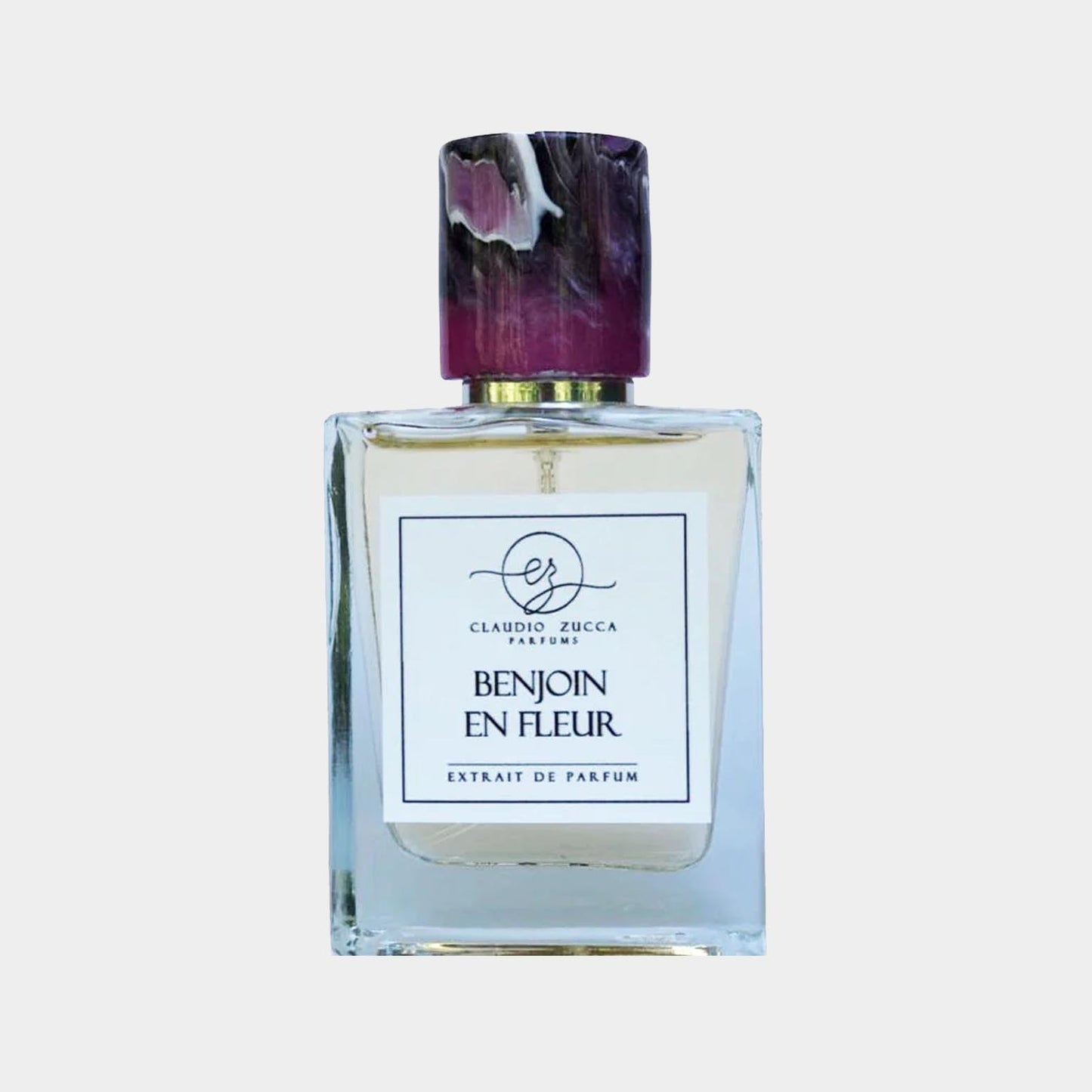 Claudio Zucca Benjoin en Fleur Sample - een elegante parfumfles met een unieke dop en een subtiele geurcompositie, perfect voor liefhebbers van exclusieve geuren.