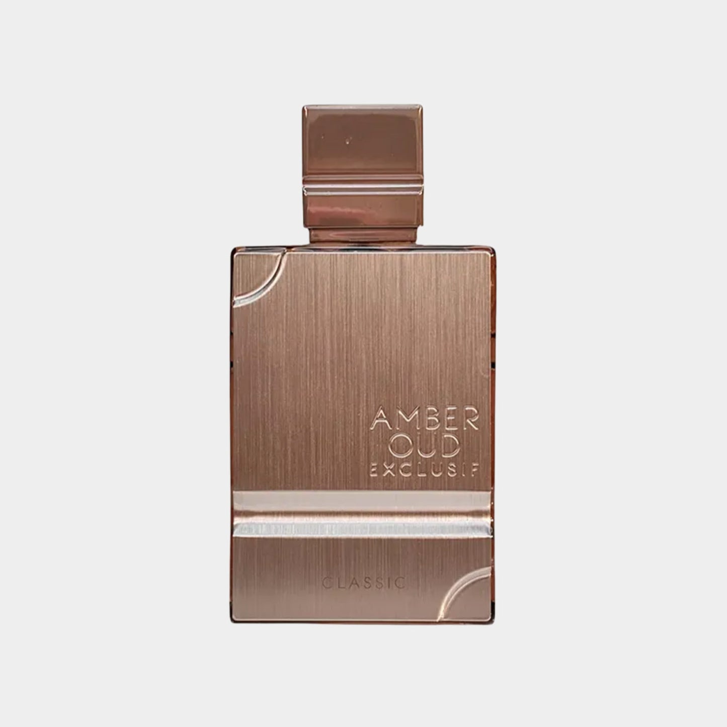 Een sample van Amber Oud Exclusif Classic Cologne, verpakt in een elegant, metallic bronskleurig flesje met een minimalistisch design.