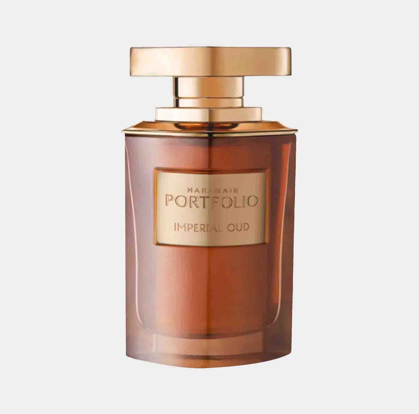 Al Haramain Portfolio Imperial Oud Sample is een elegante, amberkleurige parfumfles met een luxe gouden dop, ideaal voor liefhebbers van verfijnde geurcombinaties.