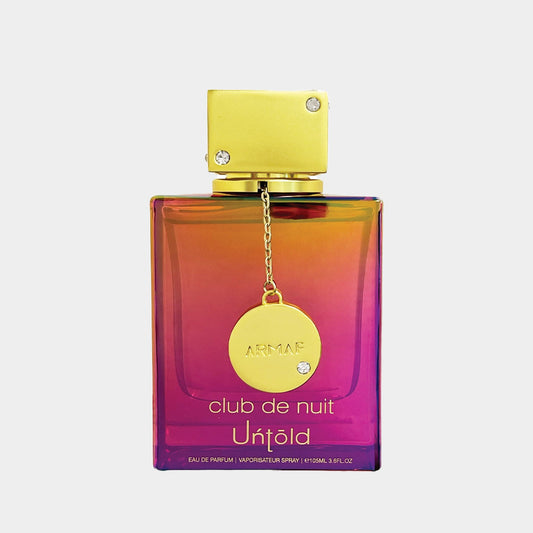 Volle fles van Armaf Club De Nuit Untold, een elegante parfum met een kleurrijk ontwerp en een gouden dop.