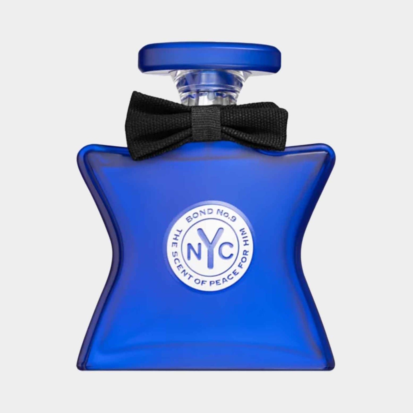 Sample of Bond No.9 The Scent of Peace For Him, presented in a star-shaped blue bottle with a black bow tie detail.