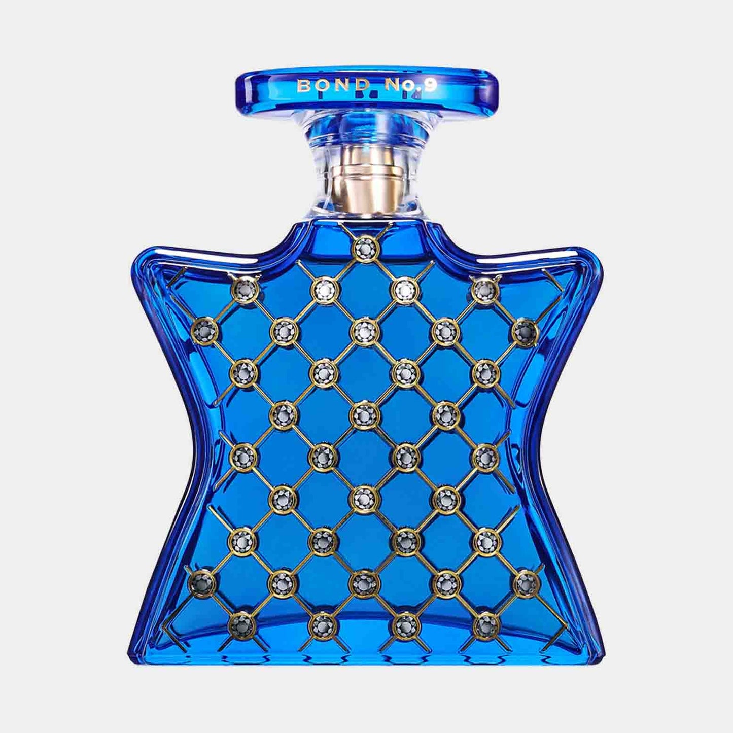 Bond No.9 NoMad Sample, een opvallende geur met een unieke stervormige blauwe fles versierd met strass-steentjes, perfect voor liefhebbers van elegante parfums.