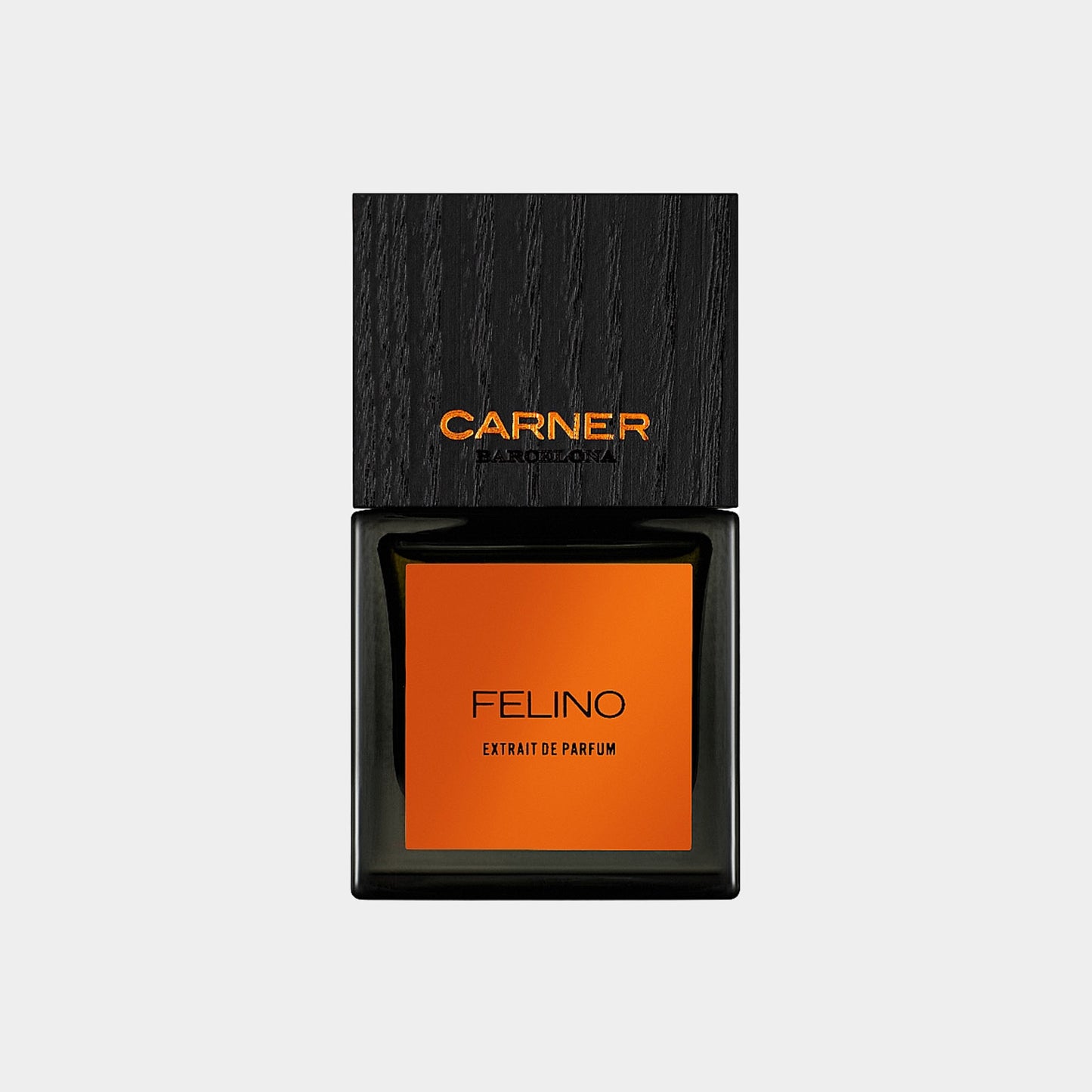 Klein flesje Carner Barcelona Felino Sample, een luxueuze parfumextract met een opvallend oranje etiket en een elegante zwarte dop, perfect voor een vleugje verfijning.