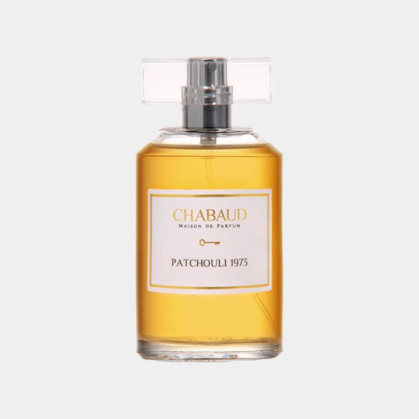 Chabaud Maison de Parfum Patchouli 1973 Sample - een elegant parfum in een transparante fles met een gouden vloeistof en een fraaie dop.