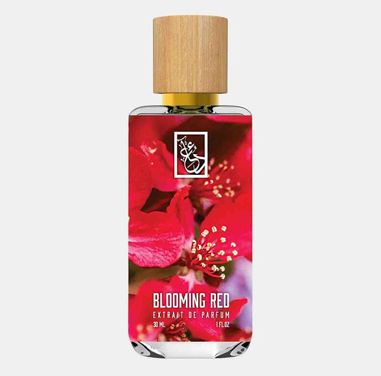 Dua Blooming Red Sample is een stijlvolle parfumfles van 30 ml, versierd met een levendige afbeelding van rode bloemen. Deze geuruitzoek is een extrait de parfum, ideaal voor liefhebbers van rijke geurcomposities.