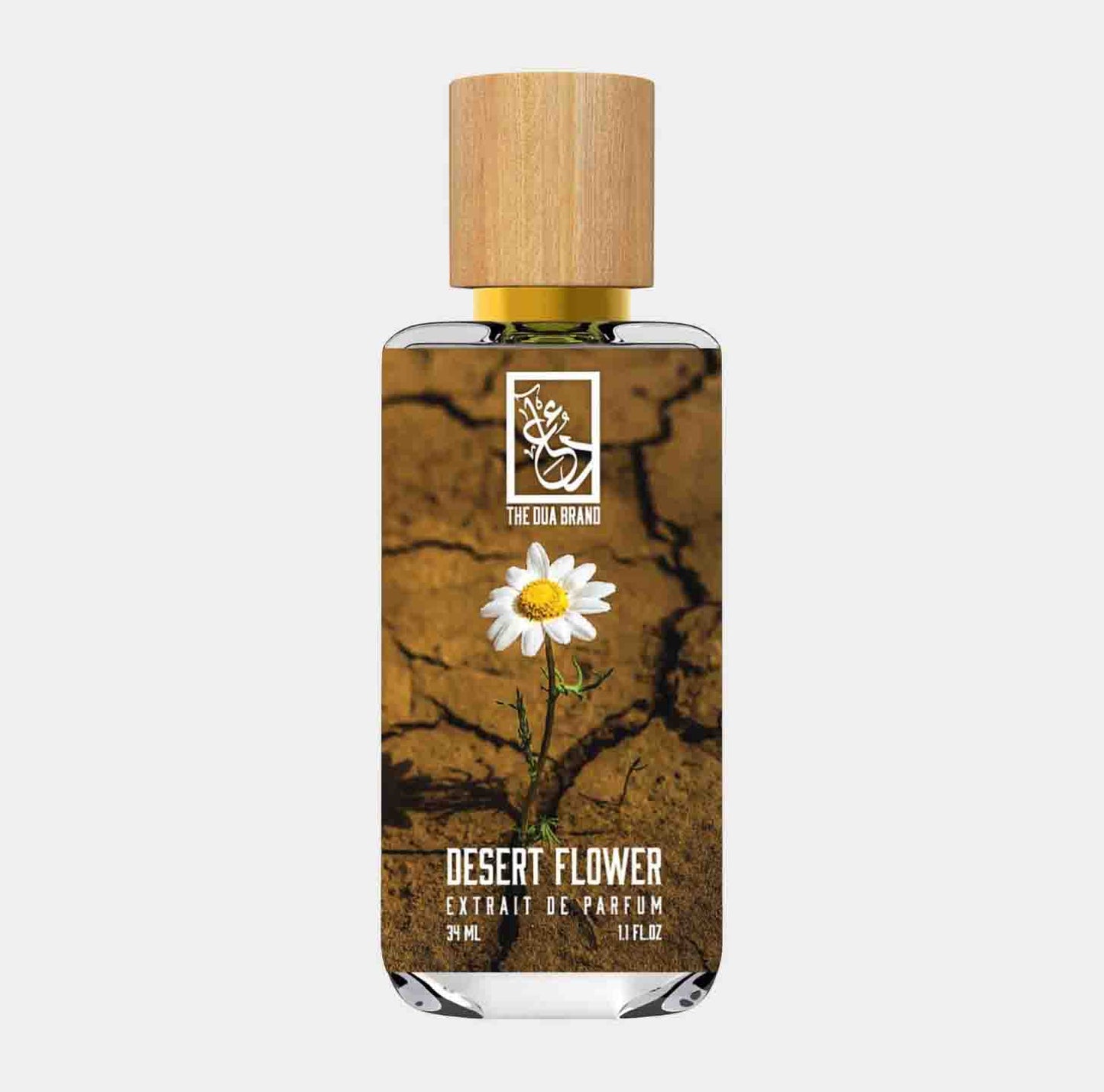 Flaskje van de Dua Desert Flower Sample parfum, met een ontwerp dat een bloeiende bloem op een dorre aarde toont. Het bevat 30 ml extrait de parfum en heeft een houten dop.