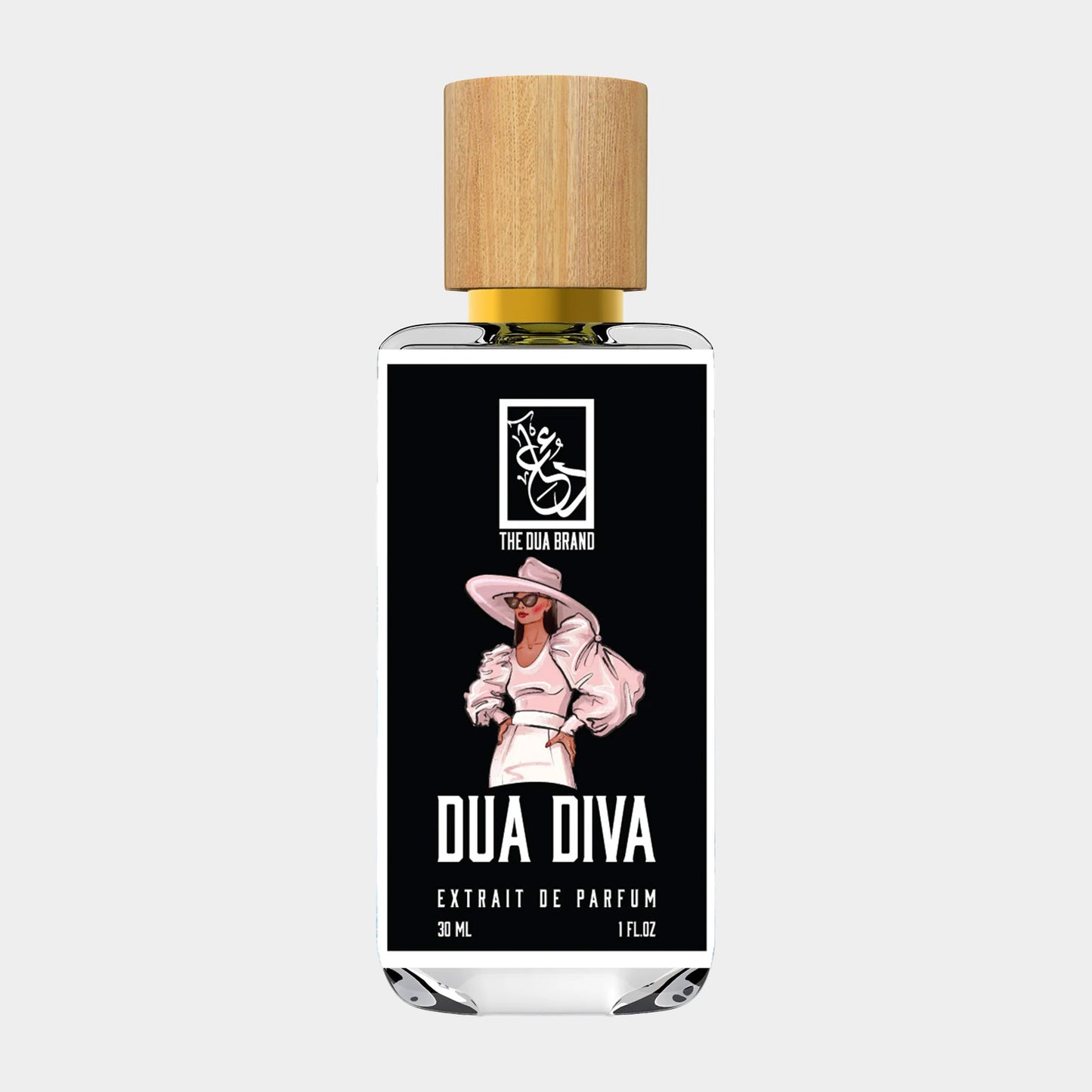 Een flesje Dua Diva van The Dua Brand, een extrait de parfum van 30 ml, met een elegante afbeelding van een modebewuste vrouw op de verpakking.