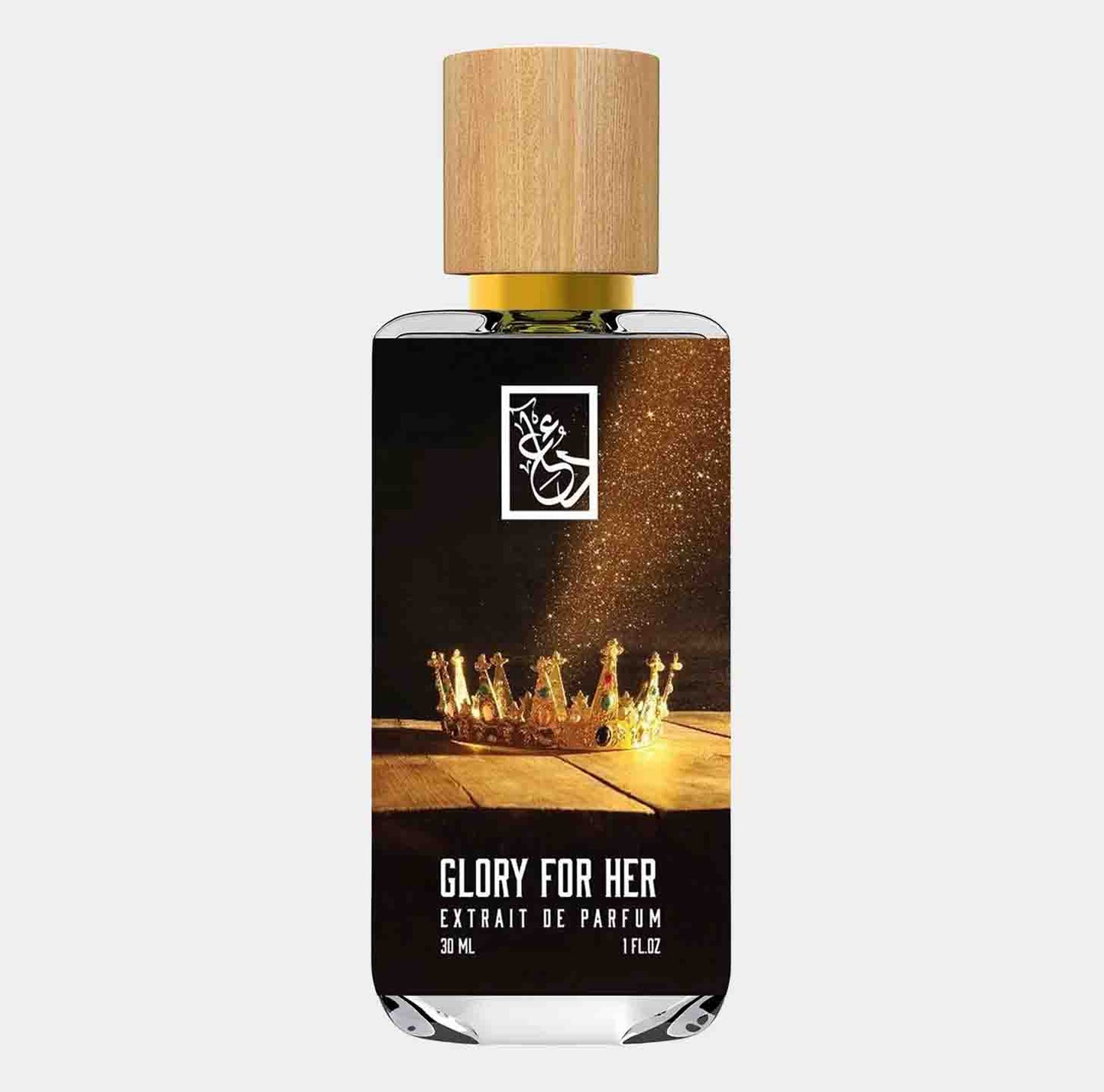 Dua Glory for Her Sample, een elegante parfumfles van 30 ml met een minimalistisch design en een houten dop, weergegeven met een gouden kroon op de achtergrond.