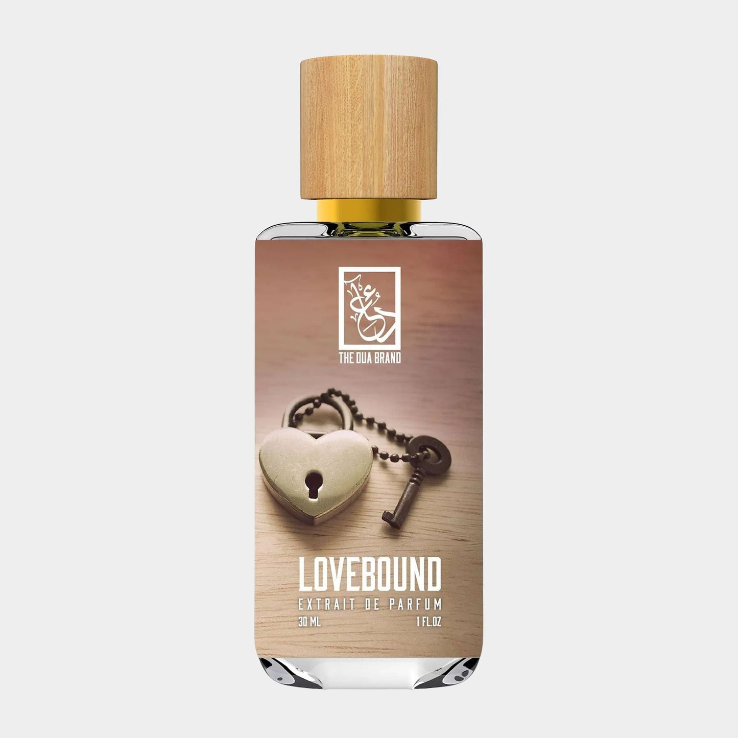 Dua Lovebound Sample is a 3 ml parfum extrait with a minimalist bottle design featuring a wooden cap and a heart-shaped lock symbol, evoking themes of romance and connection.
