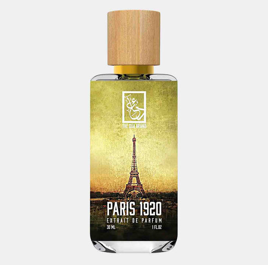 Flesje van Dua Paris 1920 Sample met een inhoud van 30 ml, gekenmerkt door een elegante verpakking en een afbeelding van de Eiffeltoren op de achtergrond.