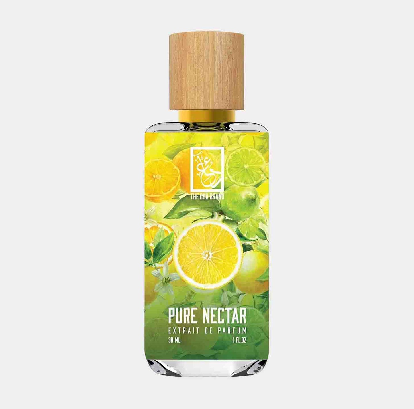 Sample van Dua Pure Nectar, een parfum-extract in een glazen fles met een houten dop, omringd door frisse citrusvruchten.