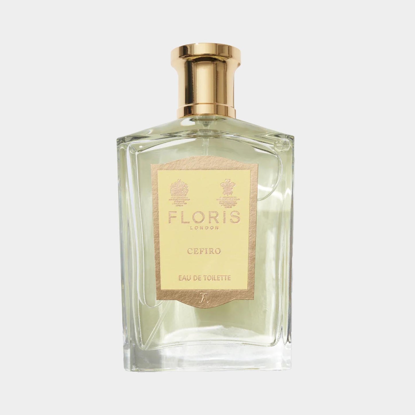 Een fles van 100 ml Floris London Cefiro Eau de Toilette, met een stijlvolle, doorzichtige verpakking en een gouden etiket. Deze geur heeft een frisse, citrusachtige geur die elegantie uitstraalt.