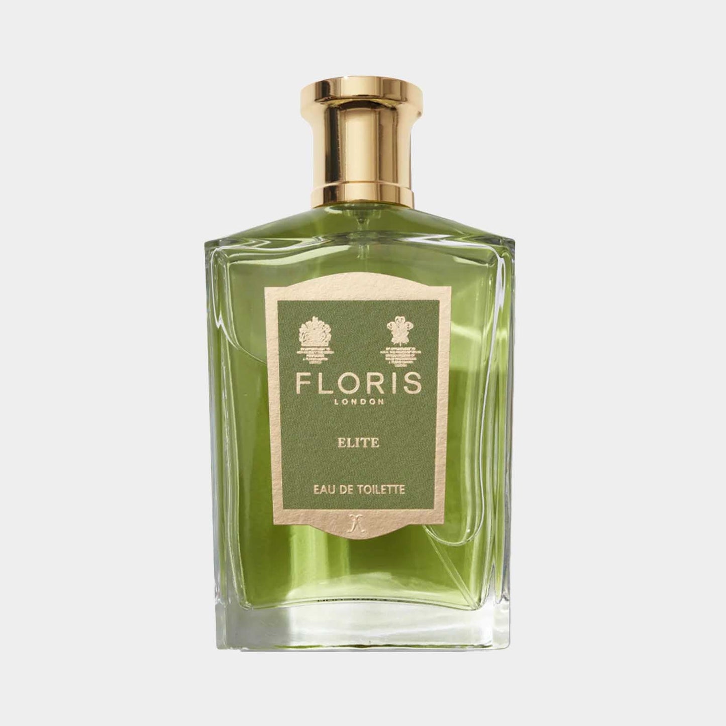 Een volle flacon Floris London Elite, een elegante eau de toilette met een groene tint en een verfijnd ontwerp. De flacon heeft een gouden dop en een label met de naam van het parfum.