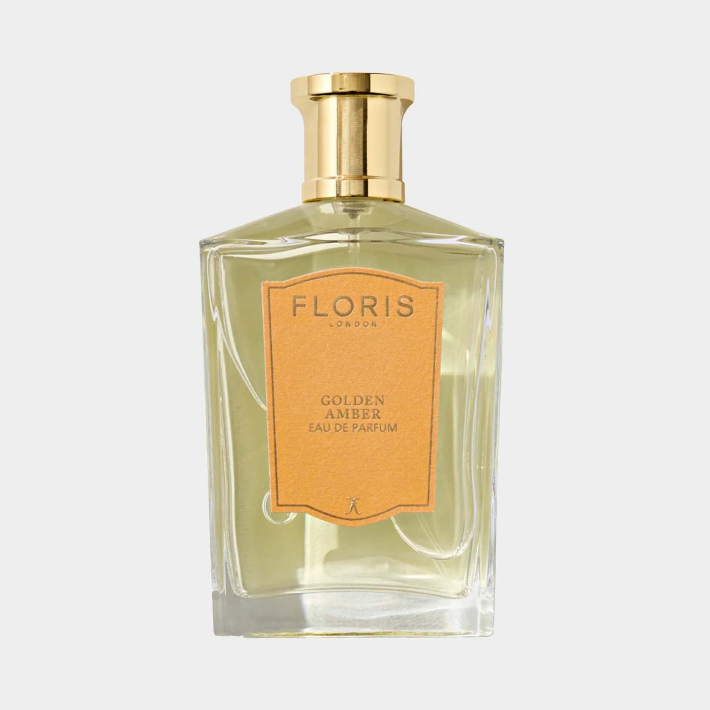 Floris London Golden Amber Sample, een elegant glazen parfumflesje met een gouden dop en een warme, amberkleurige vloeistof.