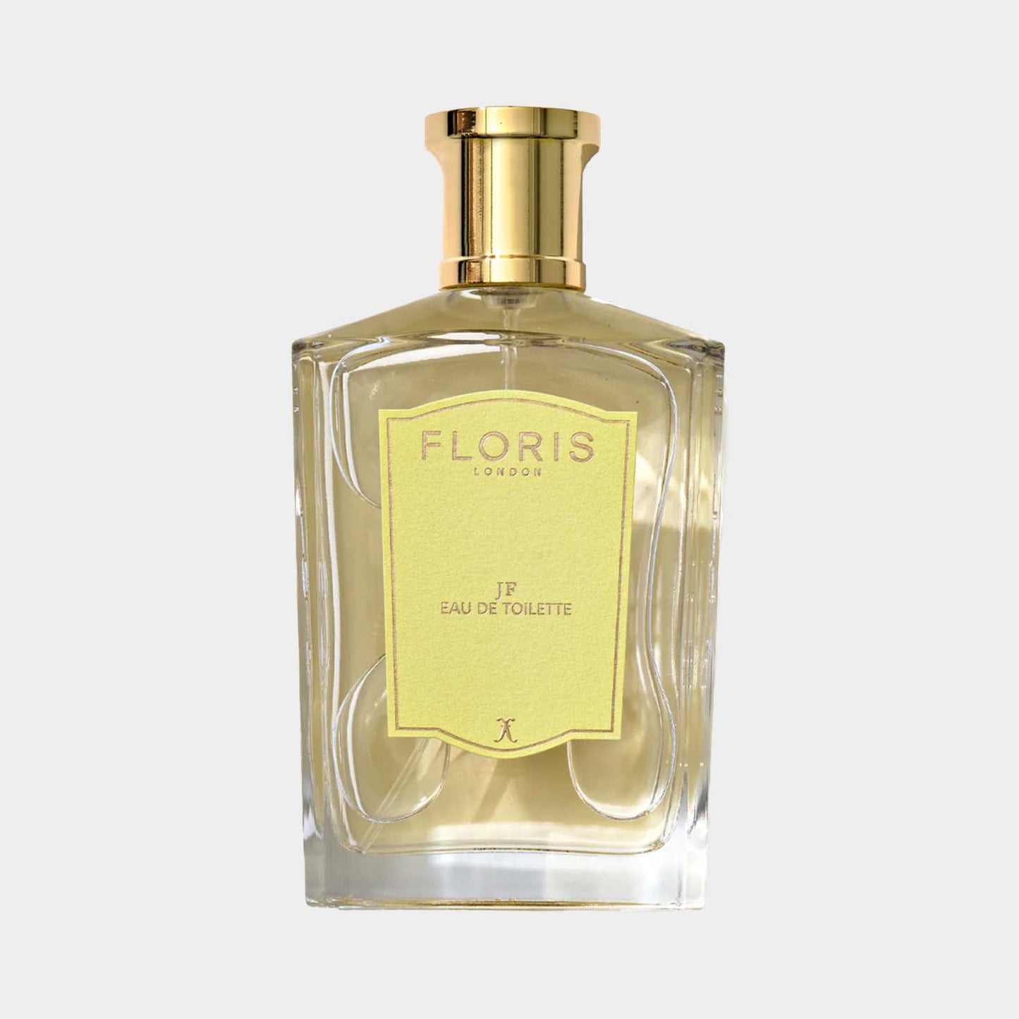 Floris London JF Sample, een elegant parfum in een glazen fles met een gele label, ideaal voor liefhebbers van verfijnde geuren.