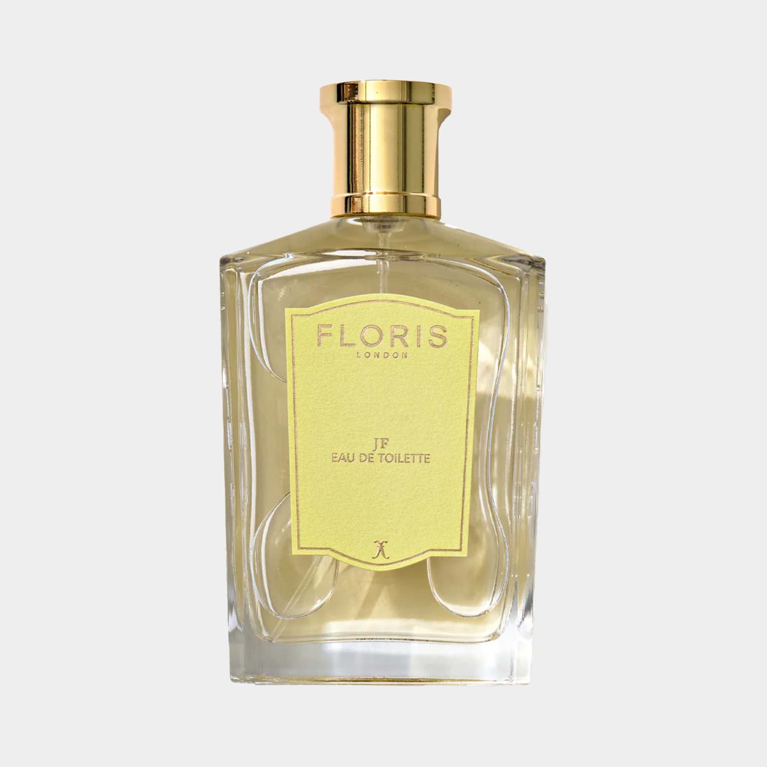Floris London JF Sample, een elegant parfum in een glazen fles met een gele label, ideaal voor liefhebbers van verfijnde geuren.