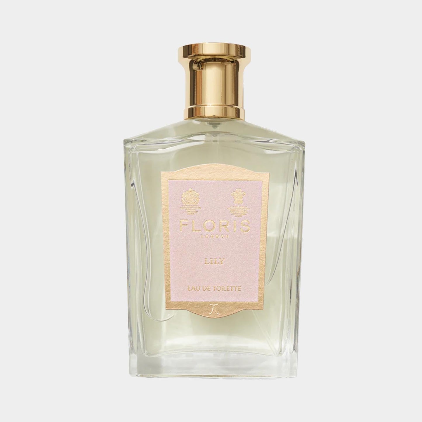 Floris London Lily Sample, een elegante glazen parfumfles met een gouden dop en een verfijnd label. Dit parfum heeft een frisse, bloemige geur.