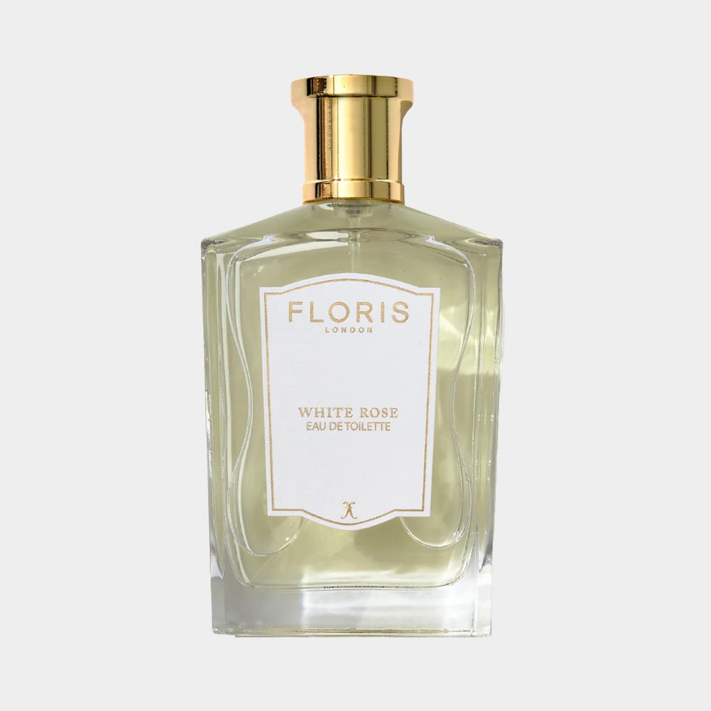 Floris London White Rose Sample is een elegant parfum in een transparante flacon met gouden details, dat een frisse en bloemige geur van witte rozen biedt.