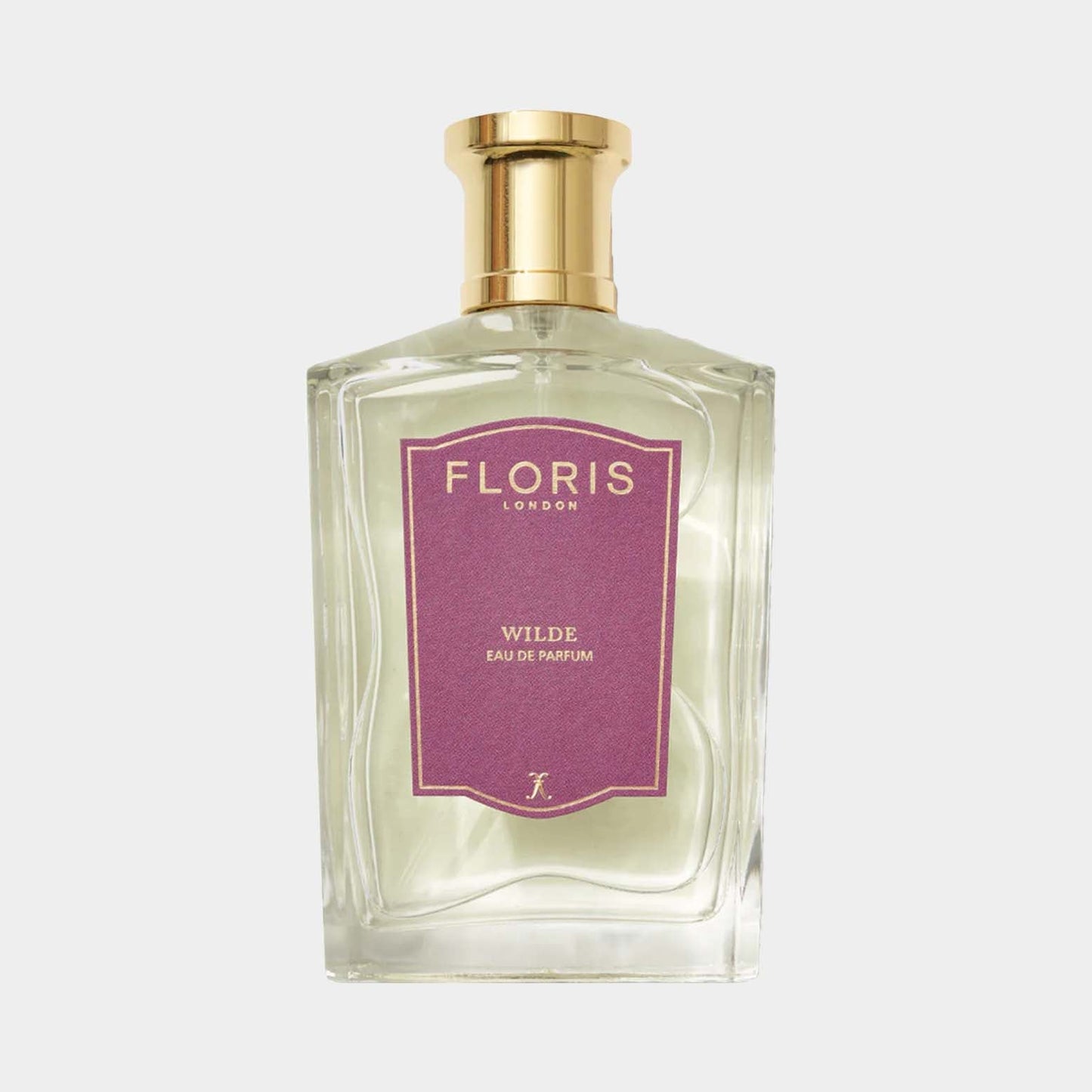 Een elegante fles van Floris London Wilde, gevuld met eau de parfum, met een stijlvolle paarse en gouden label.