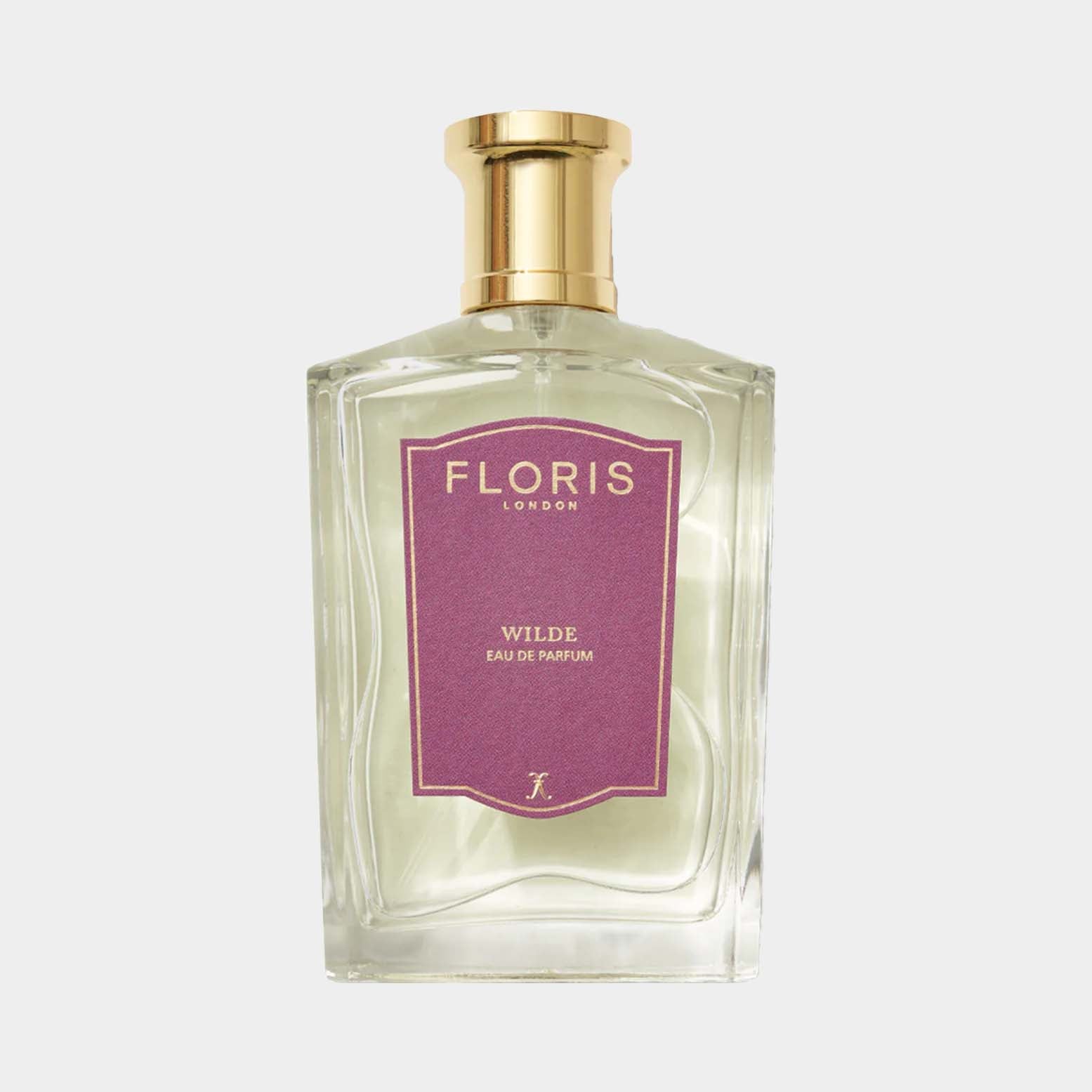 Een elegante fles van Floris London Wilde, gevuld met eau de parfum, met een stijlvolle paarse en gouden label.