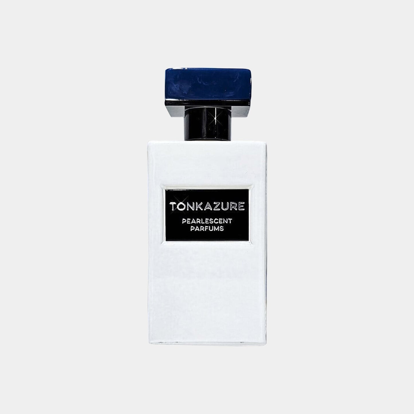 Gallagher Fragrances Tonkazure Sample in a sleek, white bottle with a dark blue cap, showcasing its elegant design.