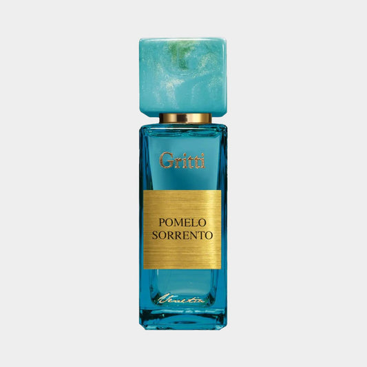 Alternatieve tekst: Gritti Pomelo Sorrento EDP monster in een eleganten glazen fles met een turquoise dop en gouden etiket. De geur belichaamt frisse citrusnoten, perfect voor een verkwikkende ervaring.