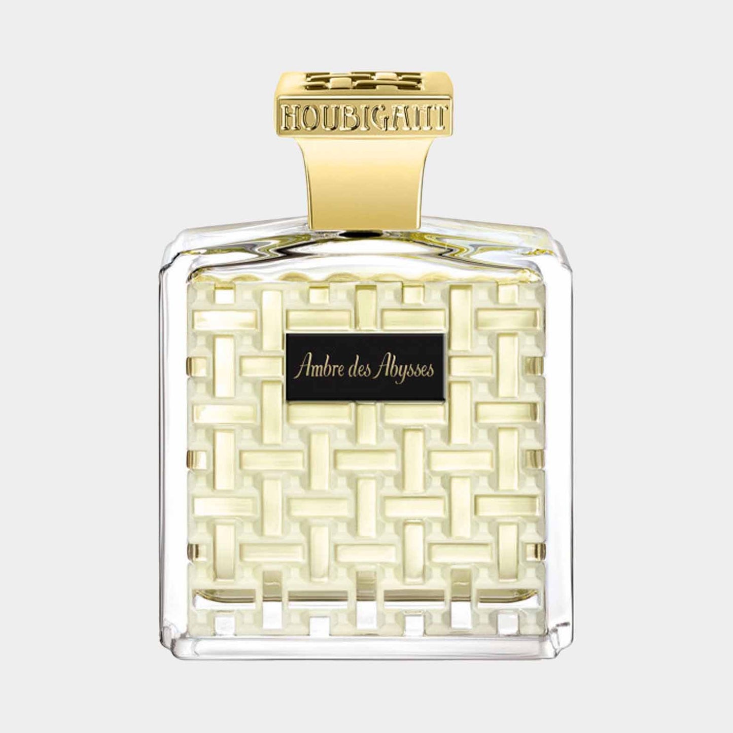 Houbigant Ambre des Abysses sample in a decorative glass bottle with a unique woven design and a gold cap.
