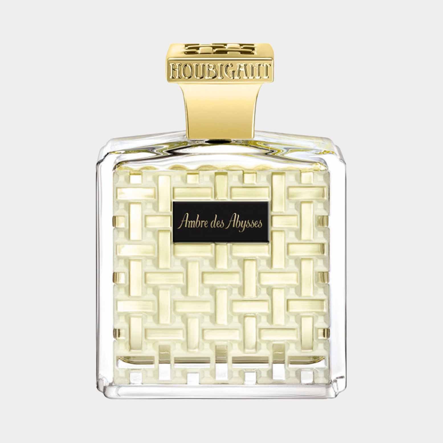 Volle fles Houbigant Ambre des Abysses, elegant verpakt in een vierkante fles met een uniek geweven design en een gouden dop.