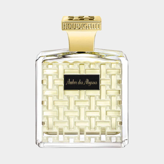 Volle fles Houbigant Ambre des Abysses, elegant verpakt in een vierkante fles met een uniek geweven design en een gouden dop.