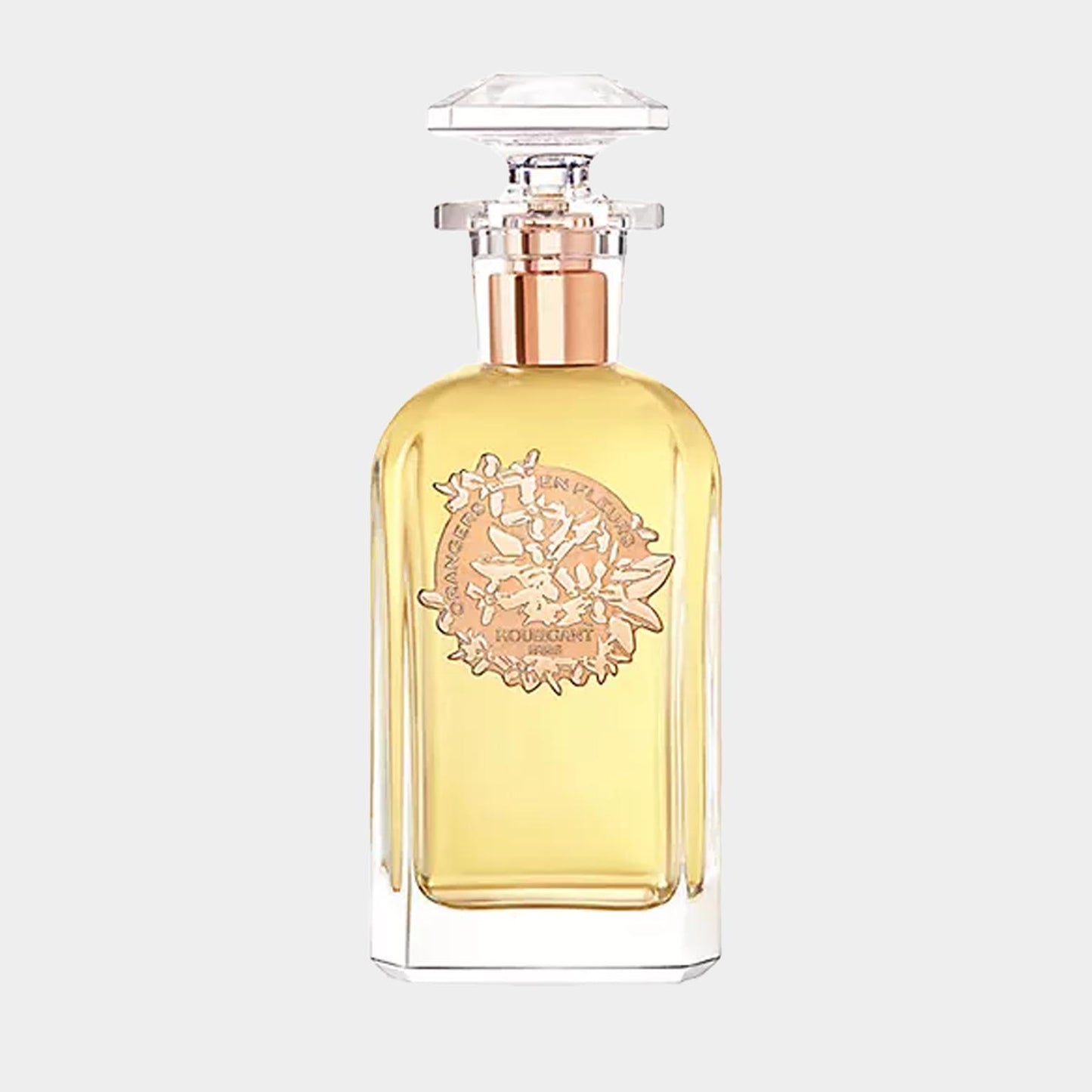 Een vol flesje Houbigant Orangers en Fleurs parfum, met een elegante glazen verpakking en een verzilverd etiket. De verfijnde geur is een harmonie van citrus en bloemige noten.