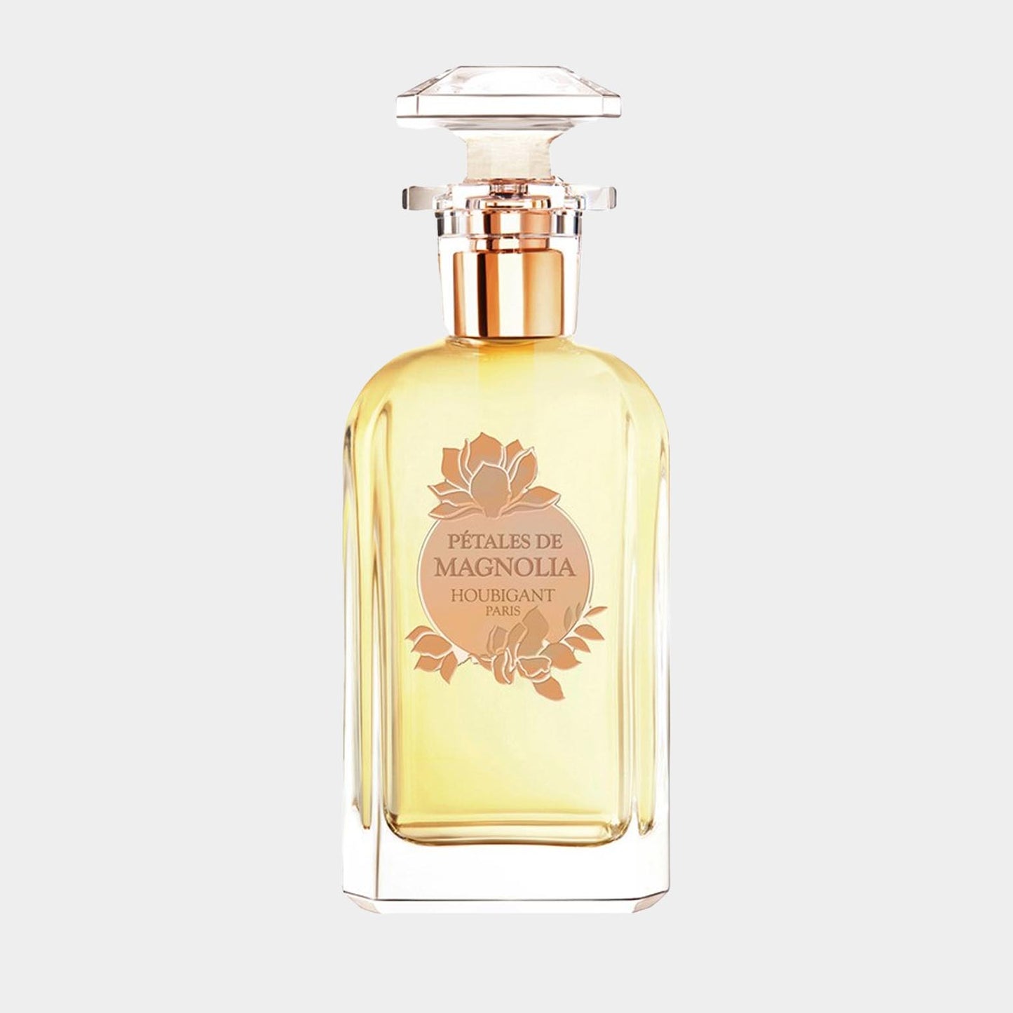 Houbigant Pétales de Magnolia Sample, een elegante parfumfles met een gouden vloeistof en een verfijnde, geometrische dop, die de verfijnde geur van magnolia weerspiegelt.