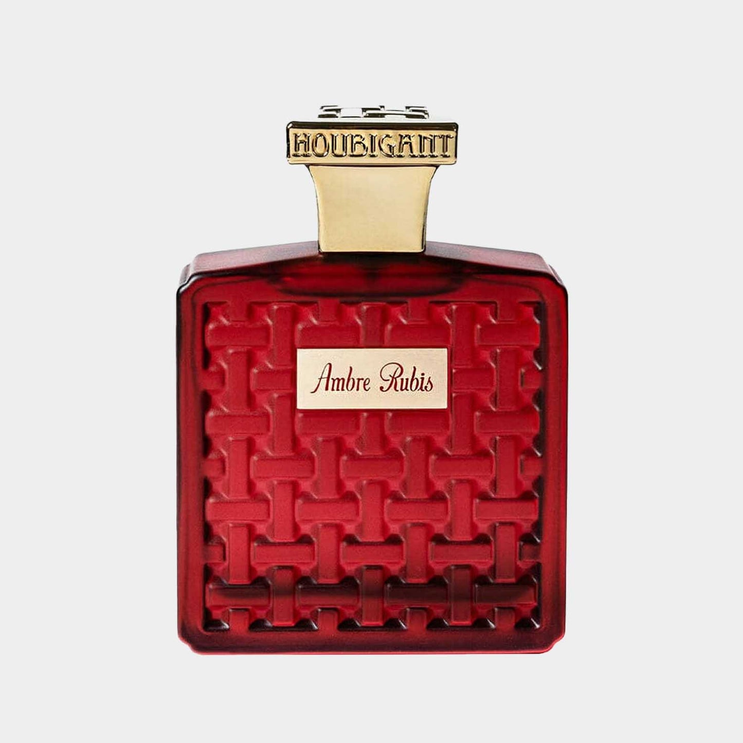 Houbigant Ambre Rubis sample, een luxe parfum in een opvallende rode fles met een geweven motief, afgewerkt met een gouden dop.