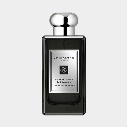 Fles van Jo Malone London Bronze Wood & Leather, een cologne intense met een elegante, donkere uitstraling en een luxe, metalen dop.