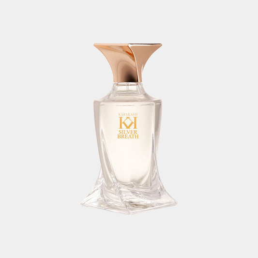 Karakash Silver Breath Sample is een elegant eau de parfum in een moderne, glazen fles met een gouden accent. Het ontwerp is verfijnd en straalt luxe uit.