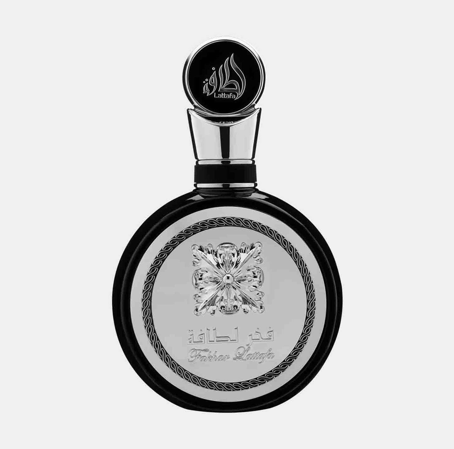 Lattafa Perfumes Fakhar Men Sample in an elegant black and silver bottle, showcasing a luxurious design with intricate detailing.