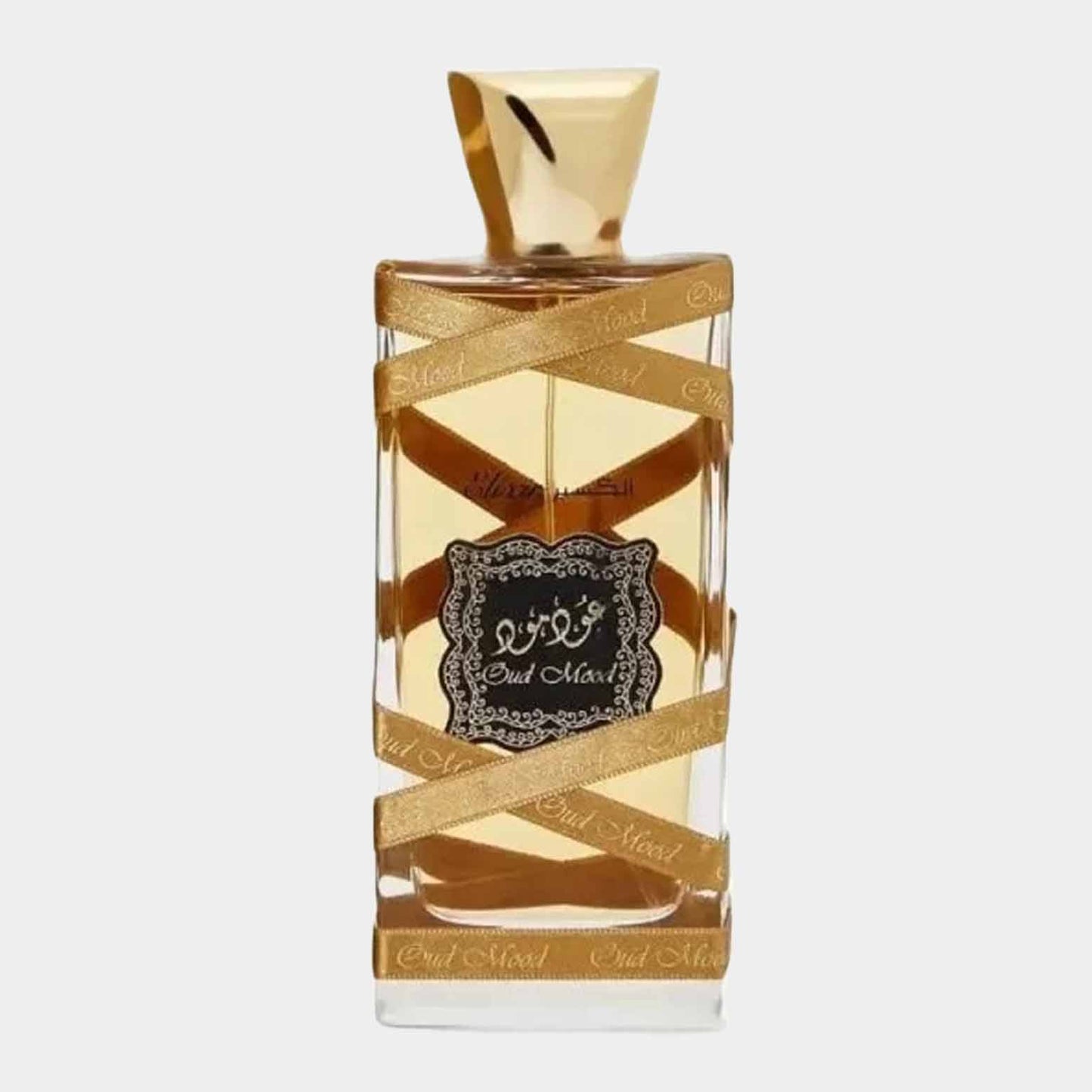 Sample van Lattafa Oud Mood Elixir, een elegante parfumfles met een gouden afwerking en een décoratieve strik. Het ontwerp straalt luxe en verfijning uit.