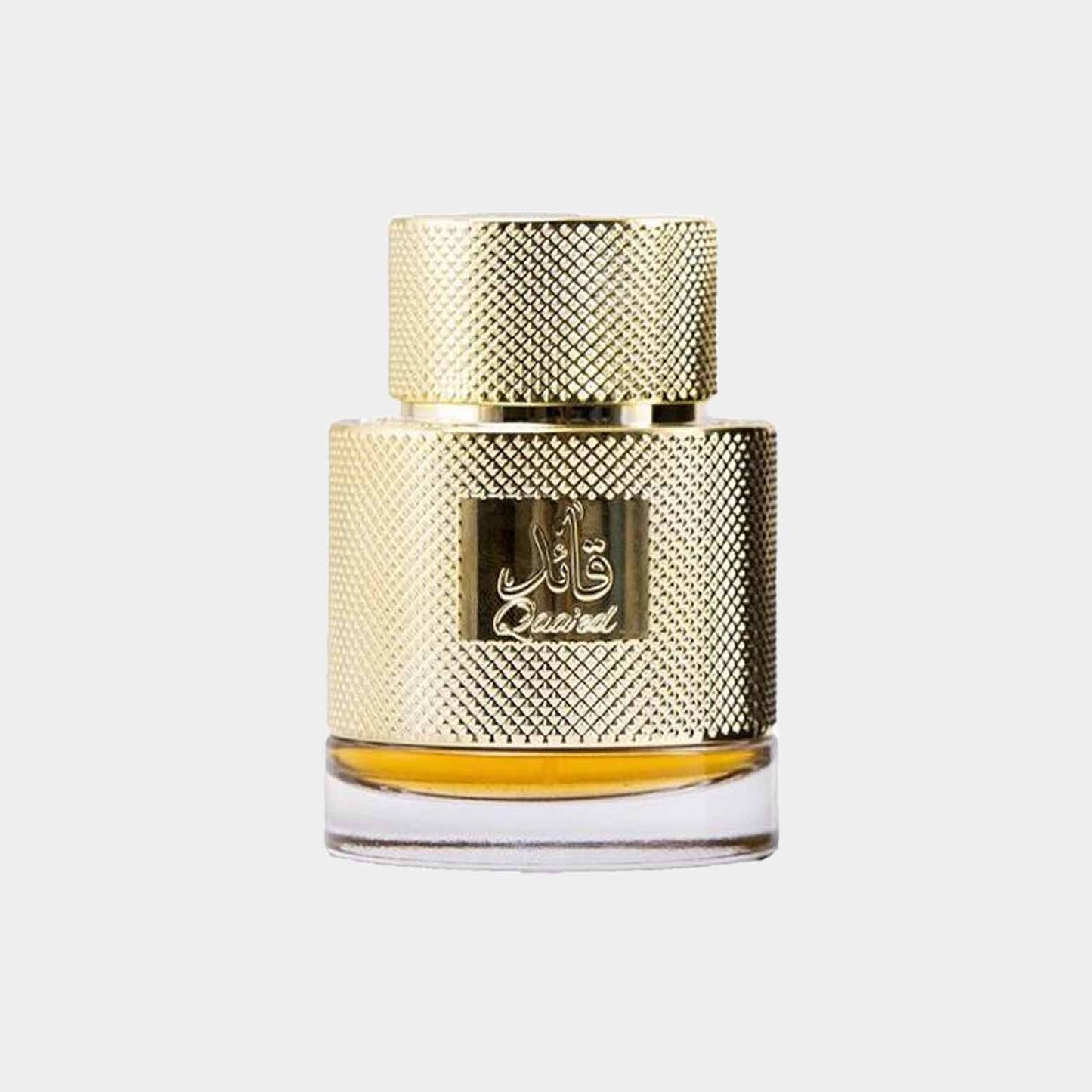 Lattafa Qaa’ed EDP sample in a luxurious gold-patterned bottle with a clear base, showcasing the fragrant amber liquid inside.