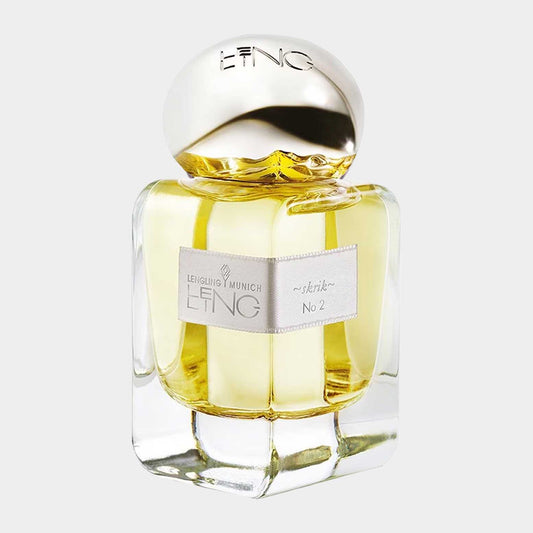 Lengling No. 2 - Skrik Sample is een luxe parfum in een elegant glazen flesje met een gouden dop. De geur belooft een verfijnde en sprankelende ervaring.