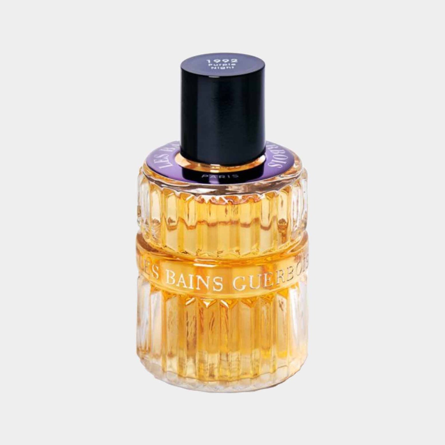 Les Bains Guerbois Purple Night 1992 monsterfles, met een elegant ontwerp en gouden vloeistof, perfect om de unieke geur van dit parfum te ervaren.
