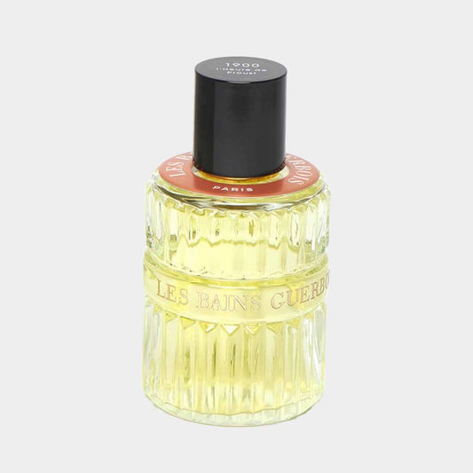 Les Bains Guerbois LHeure de Proust 1900 sample, een elegant geurmonster in een kleurrijke, vintage geïnspireerde flacon met een zwarte dop.