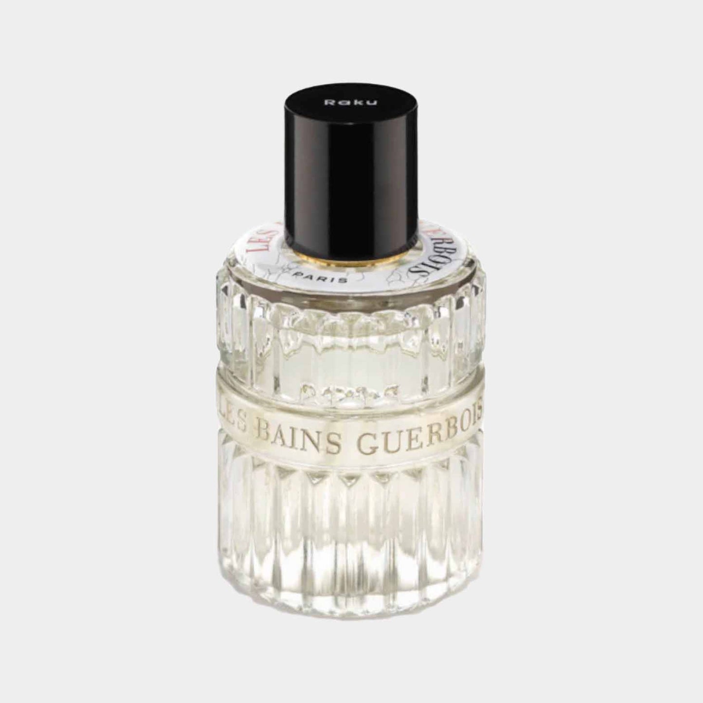 Een sample van Les Bains Guerbois Raku EDP, gepresenteerd in een elegante, gefacetteerde glazen flacon met een zwarte dop en een stijlvolle label.