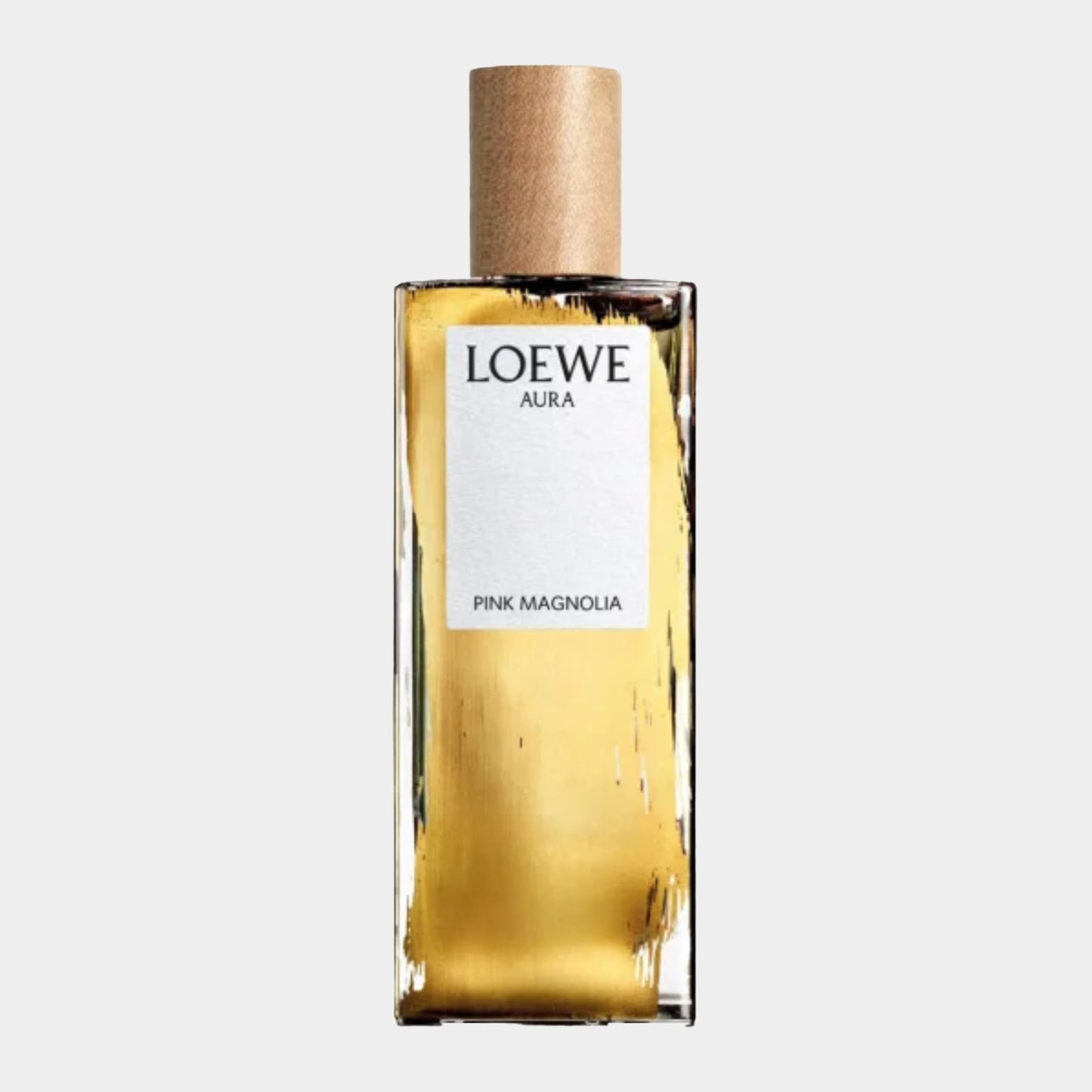 Een fles Loewe Pink Magnolia Sample met een elegante gouden vloeistof en een houten dop, perfect voor liefhebbers van verfijnde parfums.