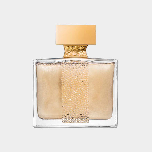 M. Micallef Ylang in Gold Sample, een elegante parfumfles met een gouden etiket en een verfijnde, glanzende uitstraling.