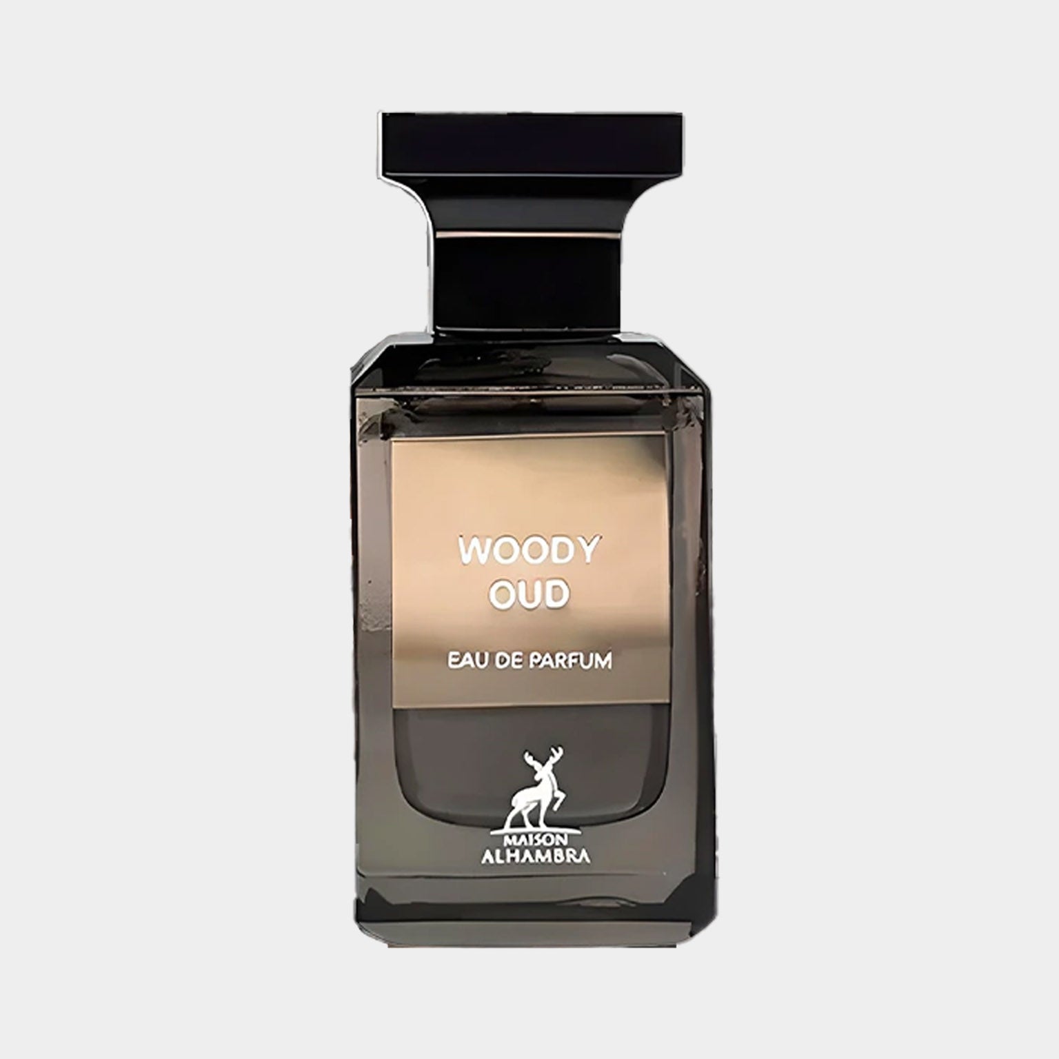 Maison Alhambra Woody Oud Sample is een elegant parfum in een verfijnde fles, met een luxe uitstraling en een diepere geurbeleving.