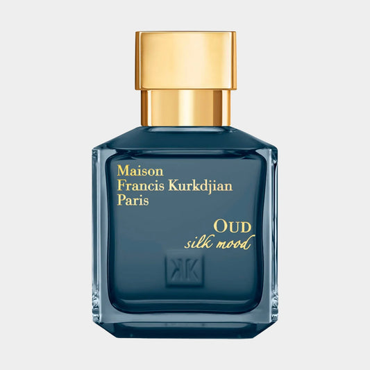 Sample van Maison Francis Kurkdjian Oud Silk Mood EXDP, een elegante parfumflacon met een luxe gouden dop en een diepe blauwe kleur, die een verfijnde geurervaring belooft.