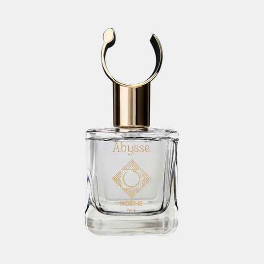 Noème Paris Abysse sample, een elegant geparfumeerde flesje met een gouden dop en verfijnd ontwerp, perfect voor het ontdekken van deze geur.