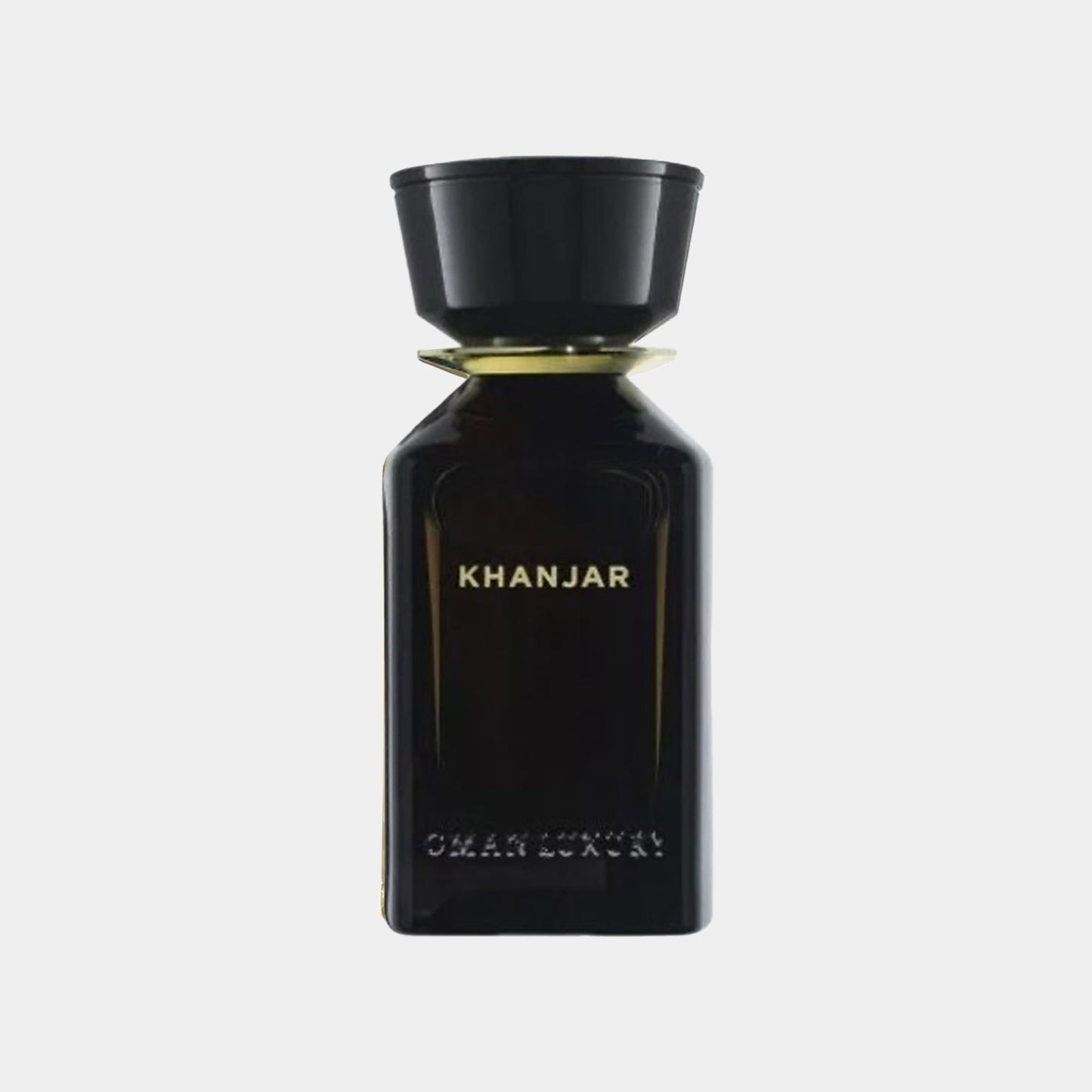 Omanluxury Khanjar Sample in een elegant, zwart parfumflesje met gouden details, perfect voor een luxe geurervaring.