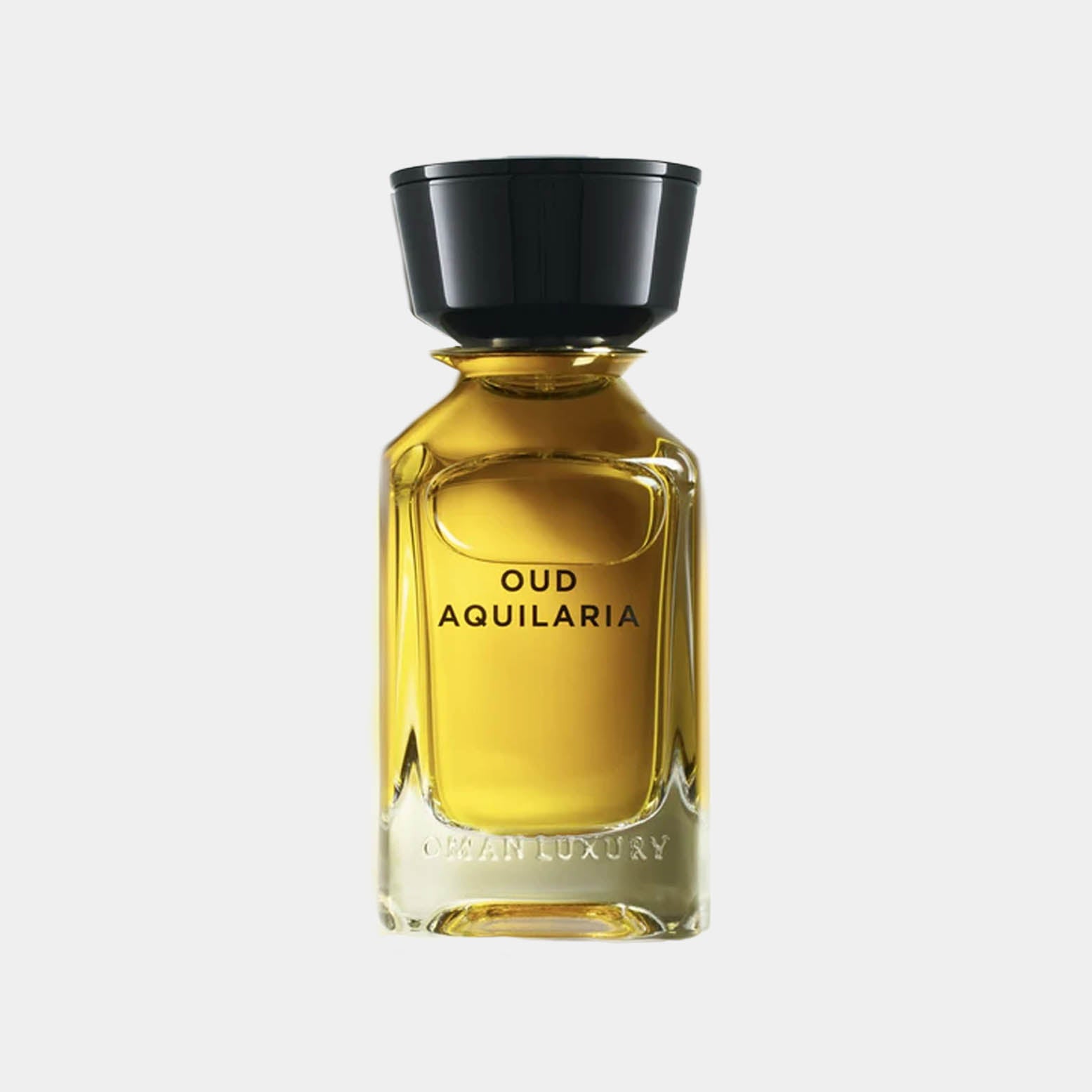 Omanluxury Oud Aquilaria sample, een elegante glazen flacon met een rijke gouden geur. Perfect voor liefhebbers van luxe geurervaringen.
